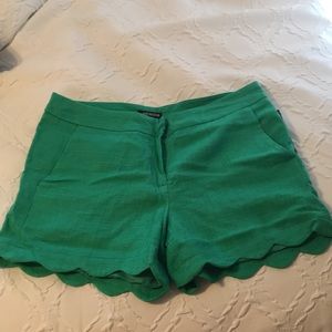 Green scalloped hem shorts